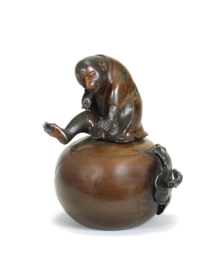 A bronze large vessel and cover in the form of a monkey perched on top of a persimmon fruit by Anonymous