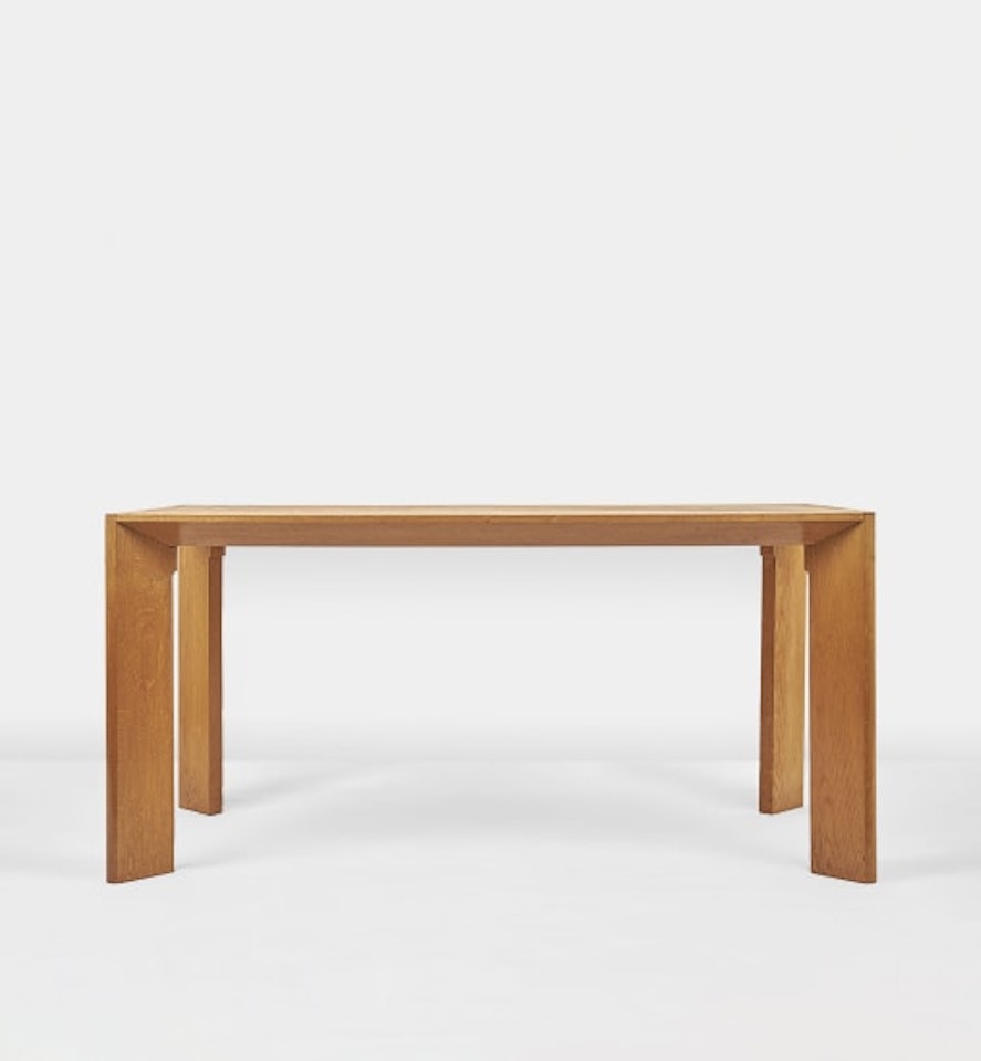 Dining table by Jean Royere