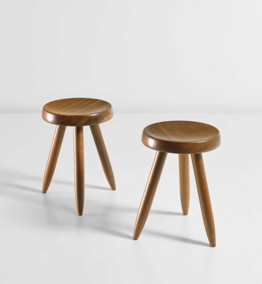 Pair of tripod stools by Charlotte Perriand