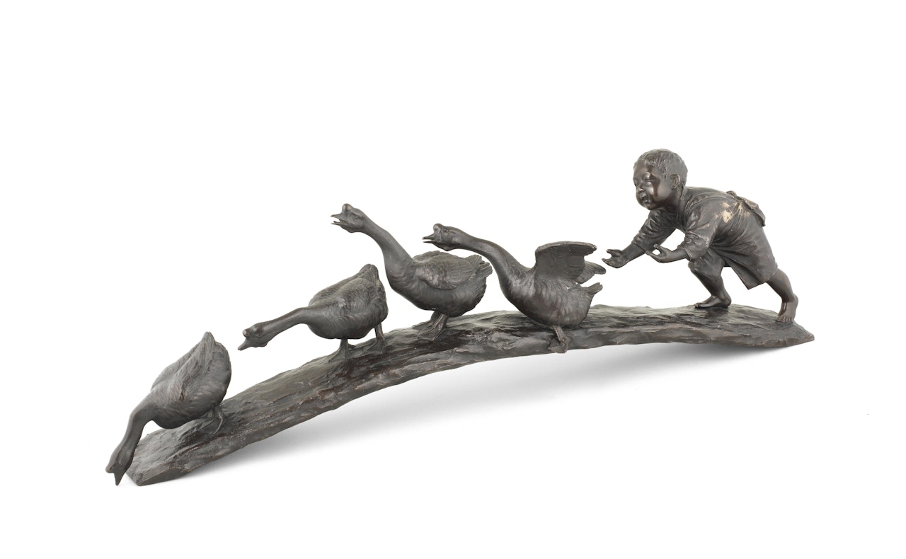 A Tokyo School bronze okimono of a boy and four geese by Anonymous