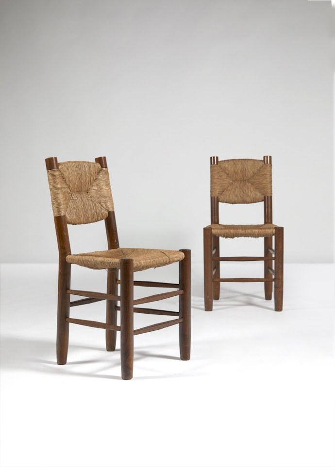 Deux chaises n°19 dites « Bauche » by Charlotte Perriand
