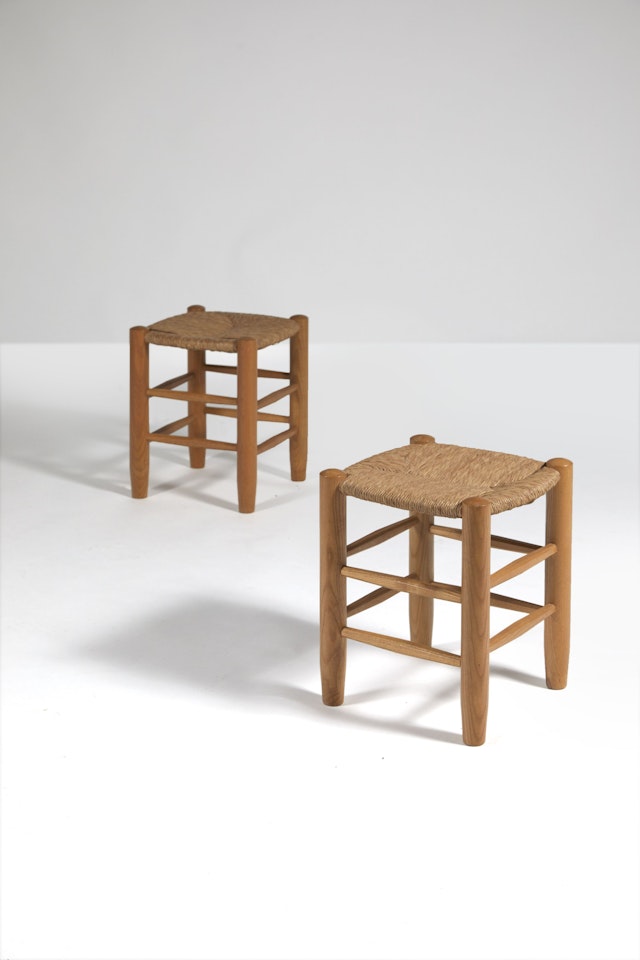 Deux tabourets paillés n°17 dits « Bauche » by Charlotte Perriand