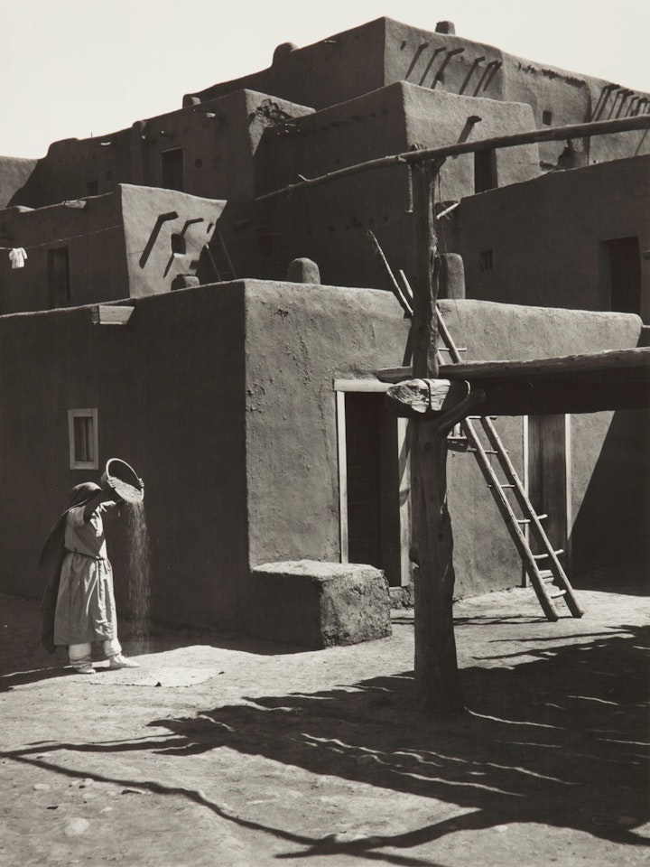 'Winnowing Grain, Taos Pueblo, New Mexico' by Ansel Adams