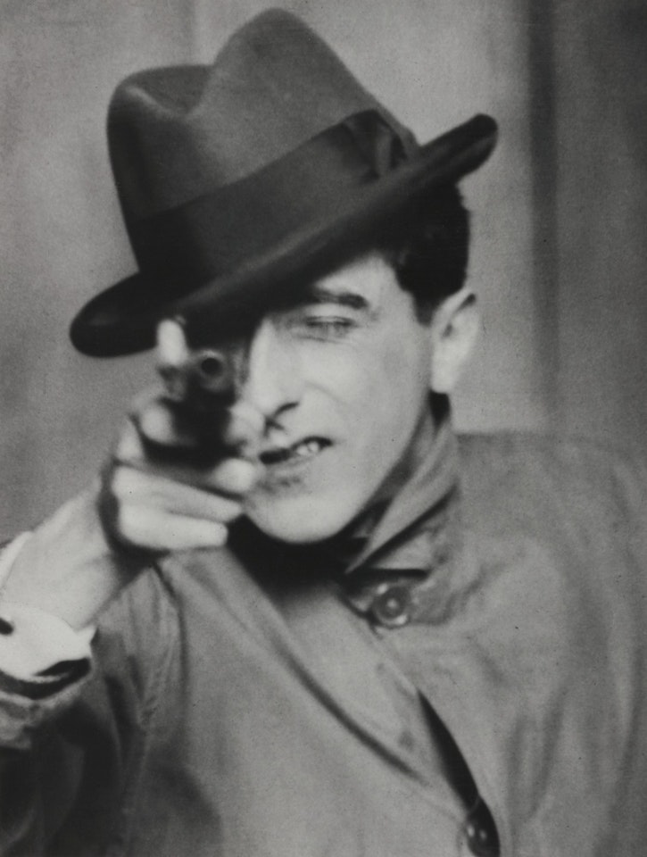 Jean Cocteau with Gun, Paris by Berenice Abbott