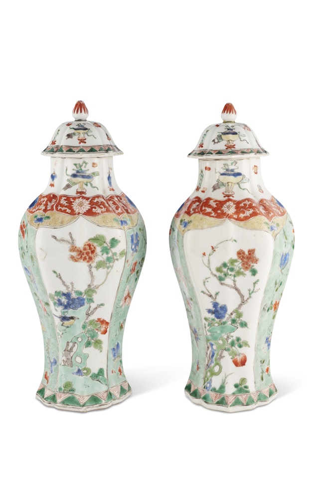 A PAIR OF FAMILLE VERTE OCTAGONAL VASES AND COVERS by Anonymous