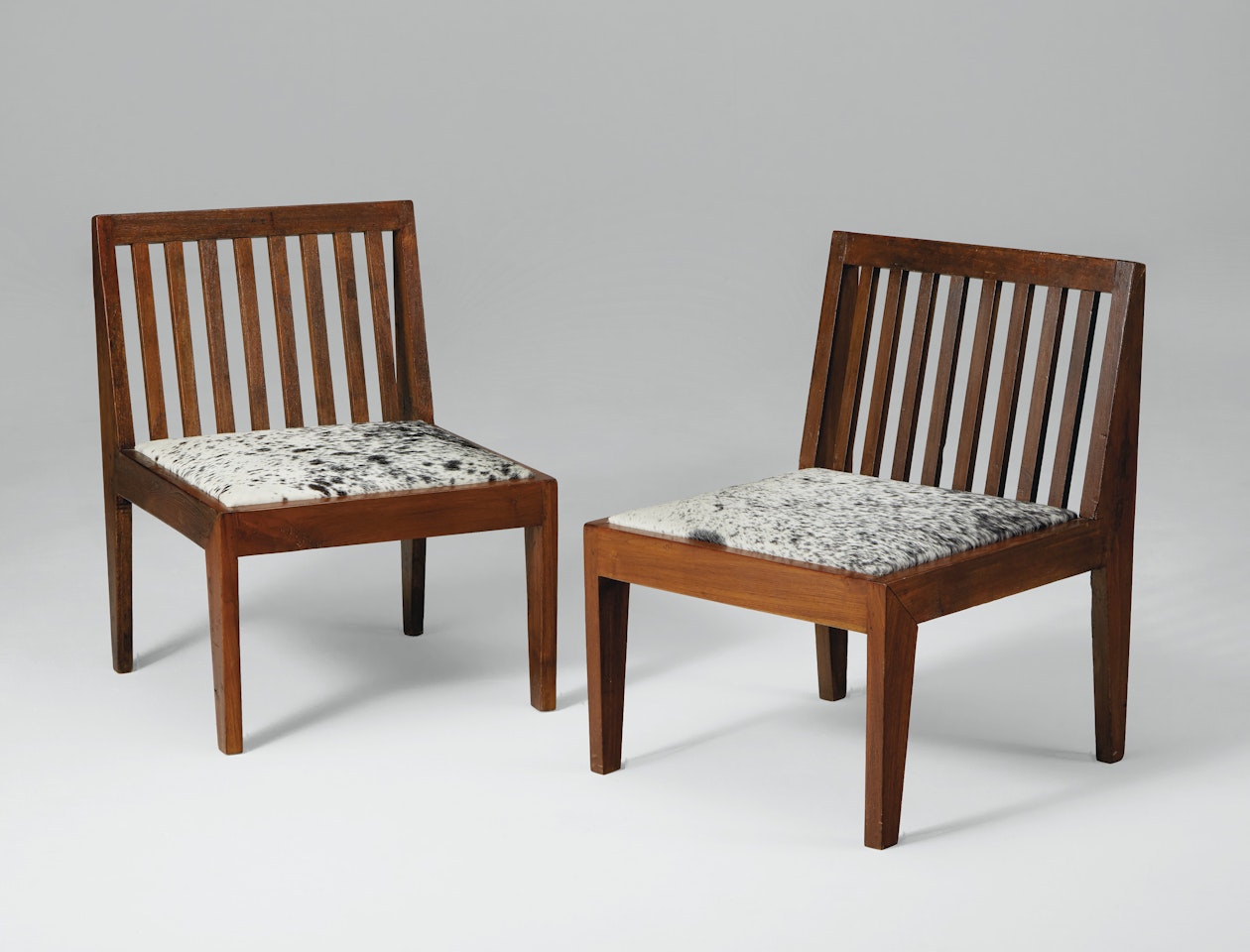 PAIR OF 'CHAUFFEUSES' by Pierre Jeanneret