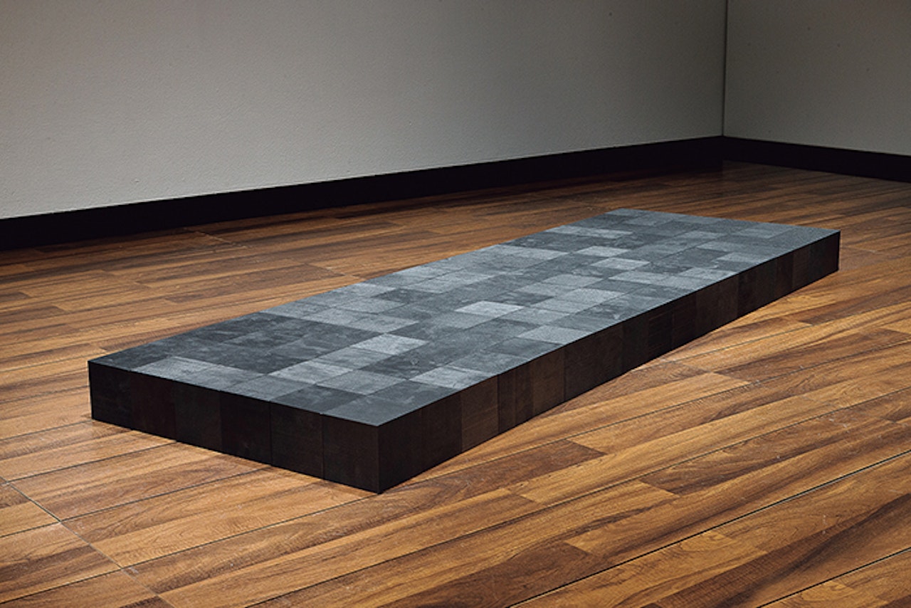 108 Carbonsite (6×18) by Carl Andre
