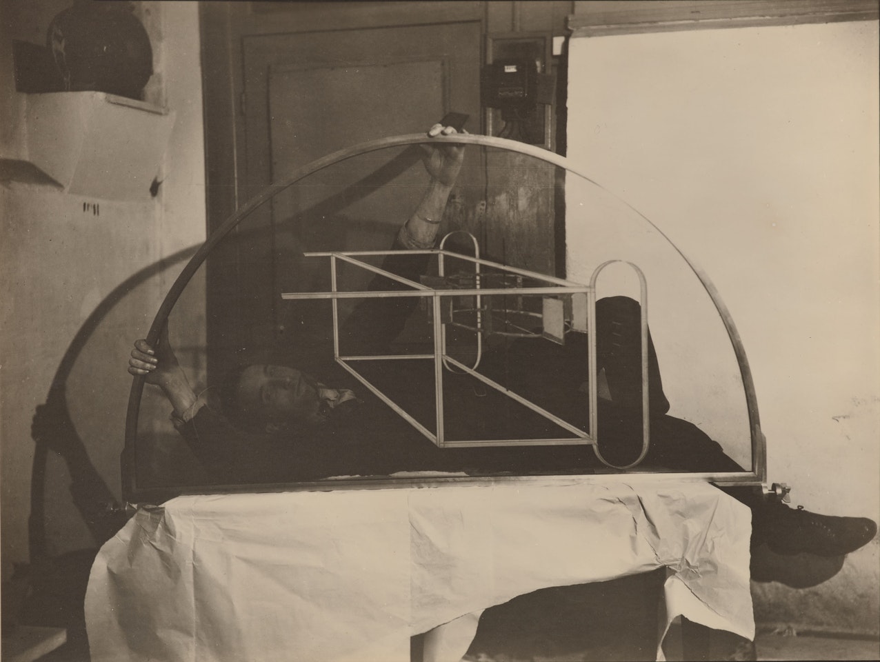Marcel Duchamp et glissière contenant un moulin à eau en métaux voisins, 1917 by Man Ray