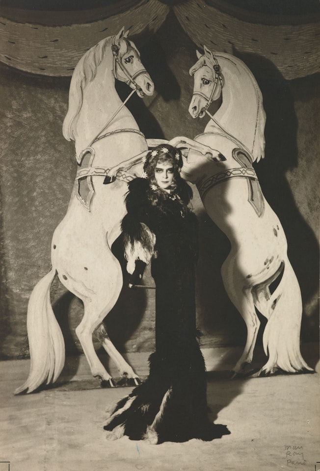 La Marquise Casati déguisée en Impératrice d'Autriche avec ses chevaux Flick et Flock au bal 'Famous Paintings', donné par le Comte Etienne de Beaumont à Paris, 1935 by Man Ray