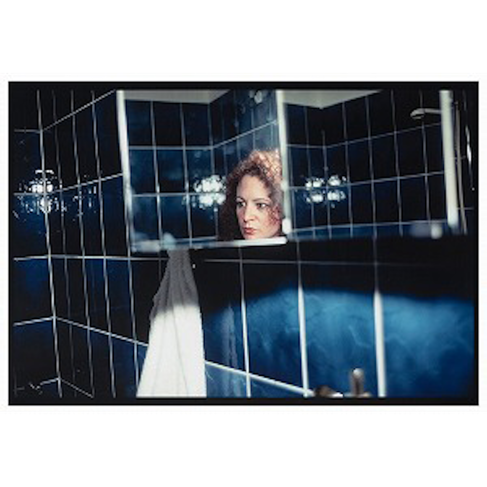 Self Portrait in my blue bathroom by Nan Goldin