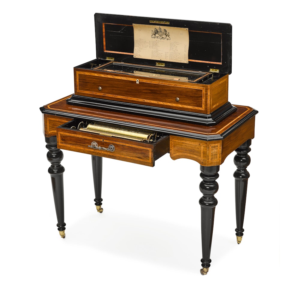 A SWISS PART EBONIZED AND INLAID WOOD MUSIC BOX ON STAND WITH SIX CYLINDERS by Anonymous