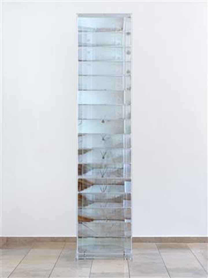 Stele, concave mirror object by Adolf Luther