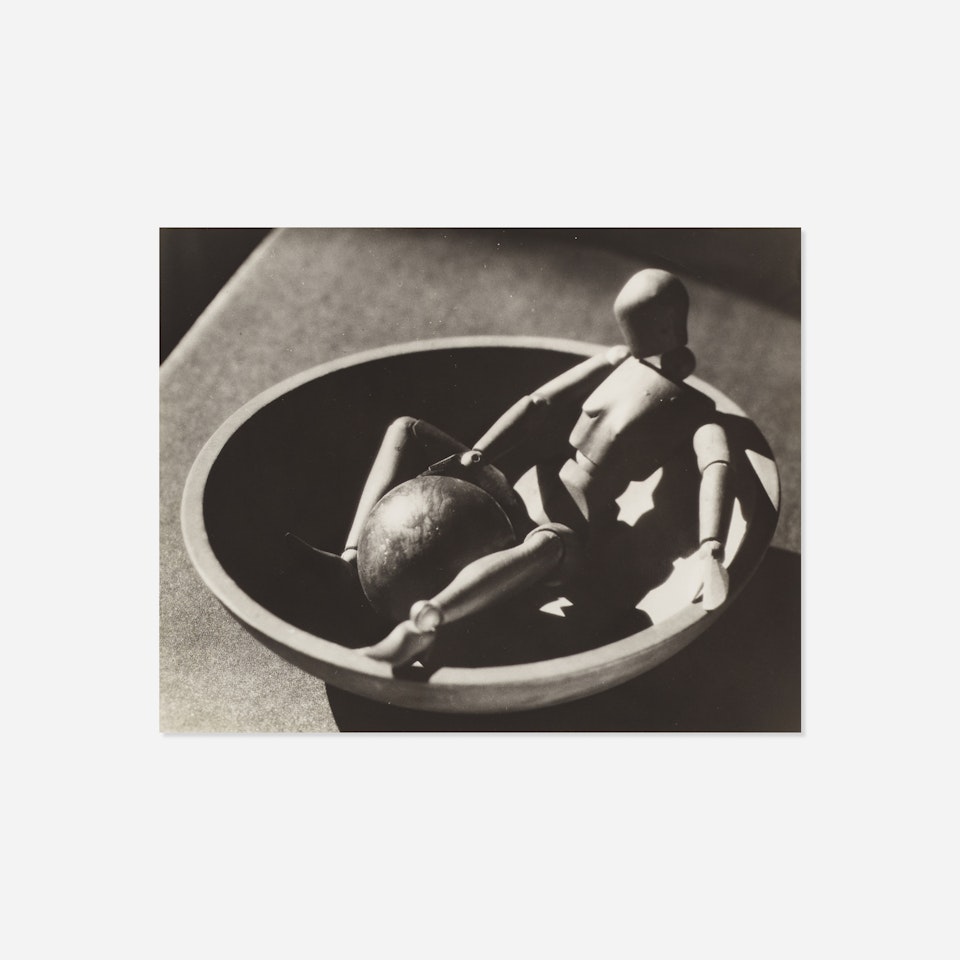 Lay Figure in a Bowl by Man Ray