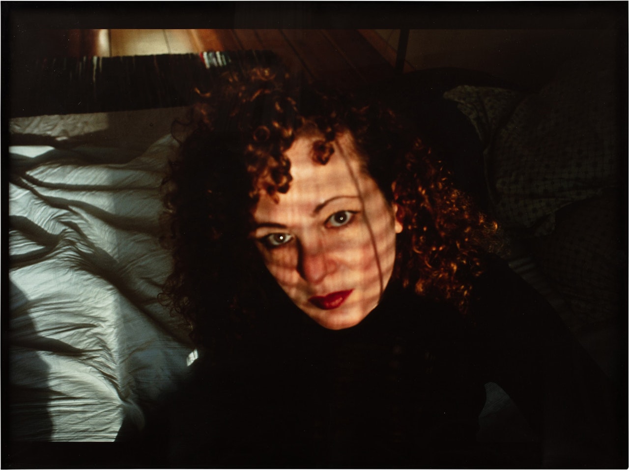 Self-portrait on my bed, Berlin by Nan Goldin