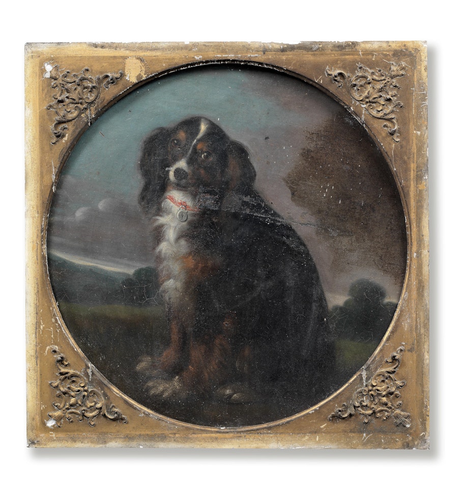 A spaniel seated in a landscape  by French School