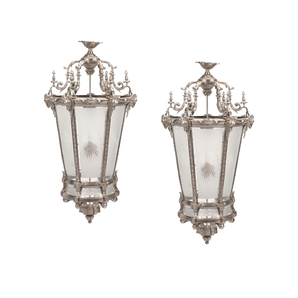 A PAIR OF BAROQUE STYLE SILVERED BRONZE AND FROSTED GLASS LANTERNS by Unknown (Baroque style)