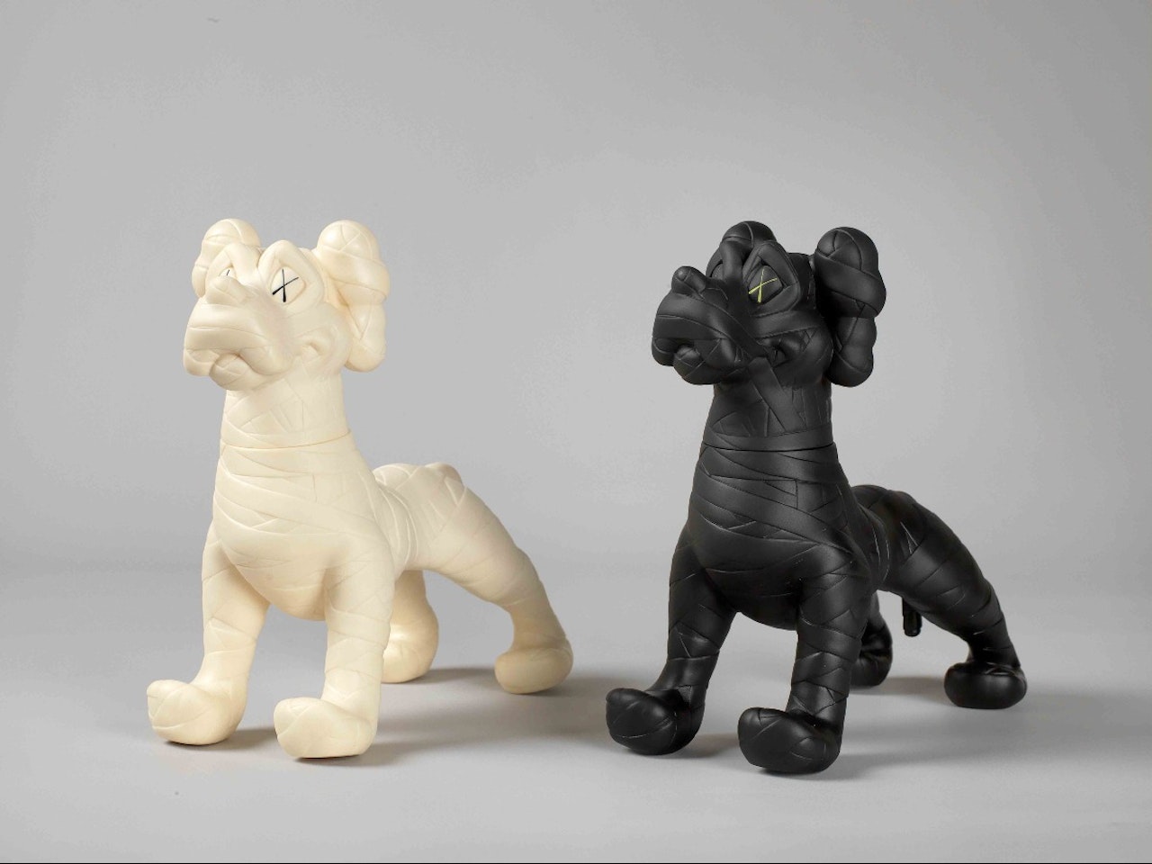 Trademark ©KAWS..07 on the bottom of left-front foot ; NEIGHBORHOODOR ZOOTH on the bottom of right-front foot; NHTOYS COMPANY on the bottom of left-hind foot; OriginalFake MEDICOM TOY MADE IN CHINA on the bottom of right-hind foot by Kaws