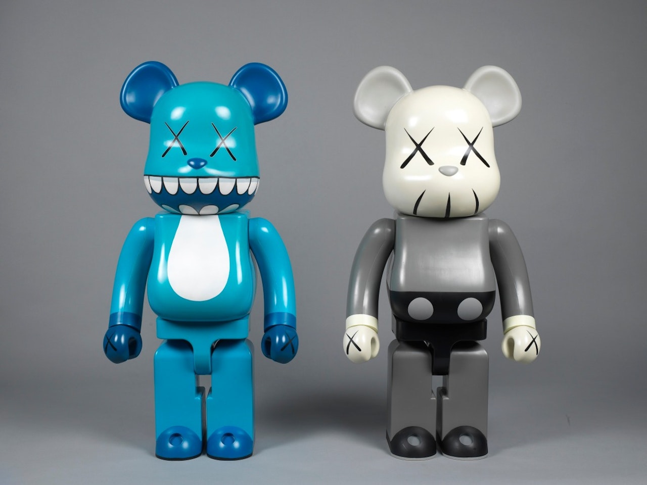 Chompers Bearbrick 1000%; Bearbrick 1000% (Grey) (a set of 2) by Kaws