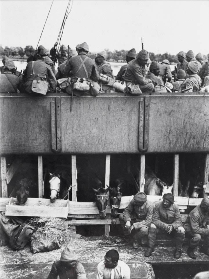Last Boat Leaving Brailov, Roumania before Revolution, Turkish Occupational Forces on Boat  by André Kertész