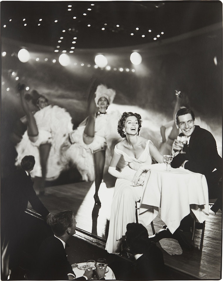 Suzy Parker and Robin Tattersall, Evening dress by Grès, Moulin Rouge, Paris, August, 1957 by Richard Avedon