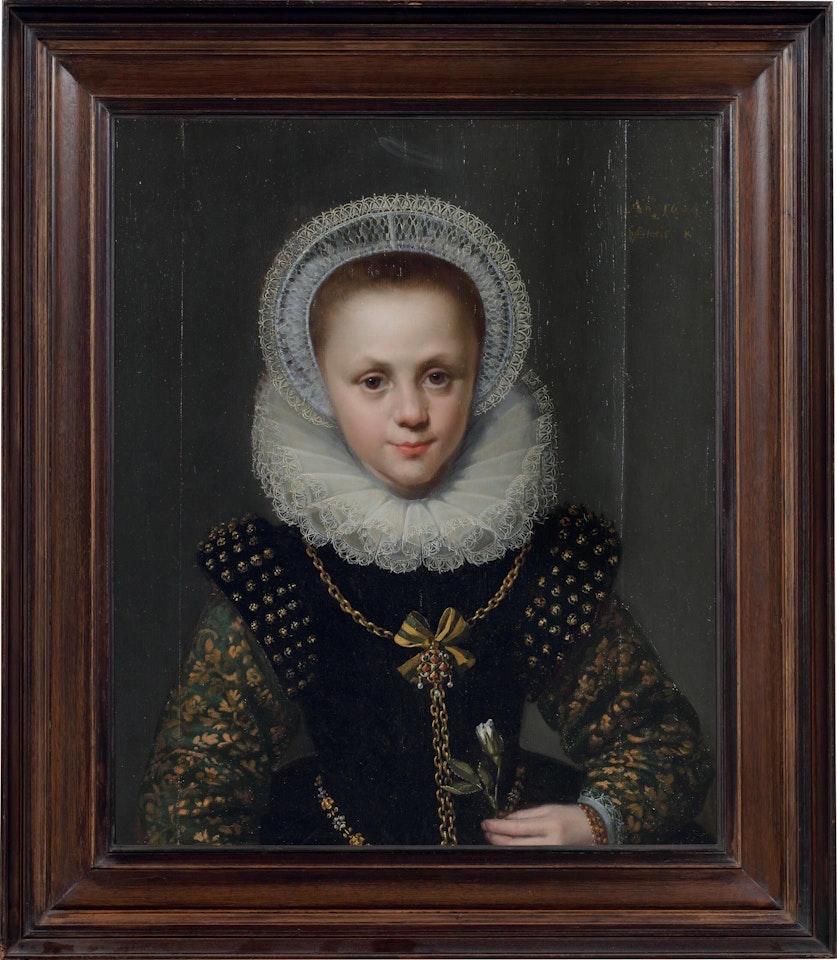 Portrait of an eight-year-old girl holding a white rose, half-length by Dutch School