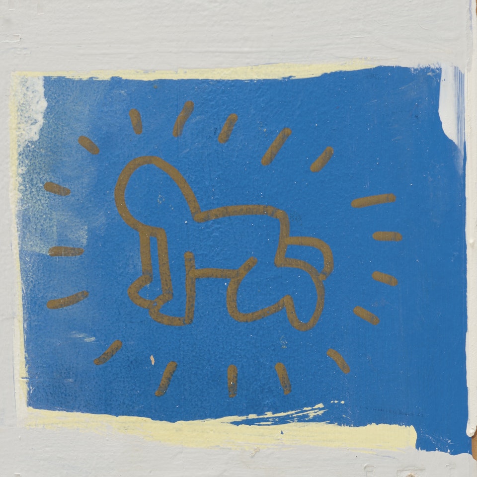 Radiant Baby (Wall Drawing) with childhood ephemera by Keith Haring