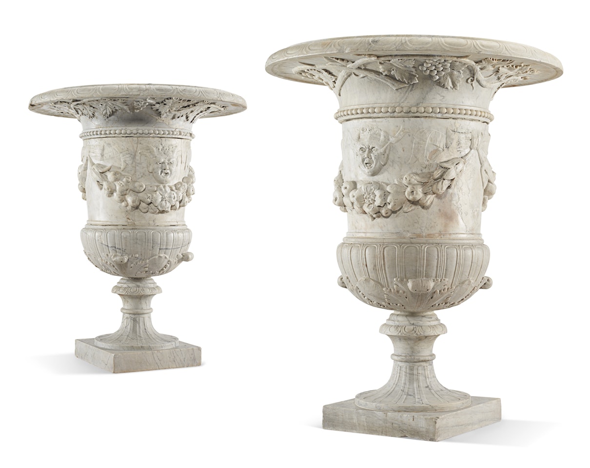 A PAIR OF WHITE MARBLE URNS by Italian School