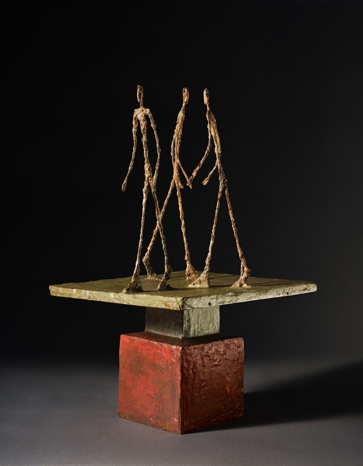 Trois hommes qui marchent (grand plateau) by Alberto Giacometti