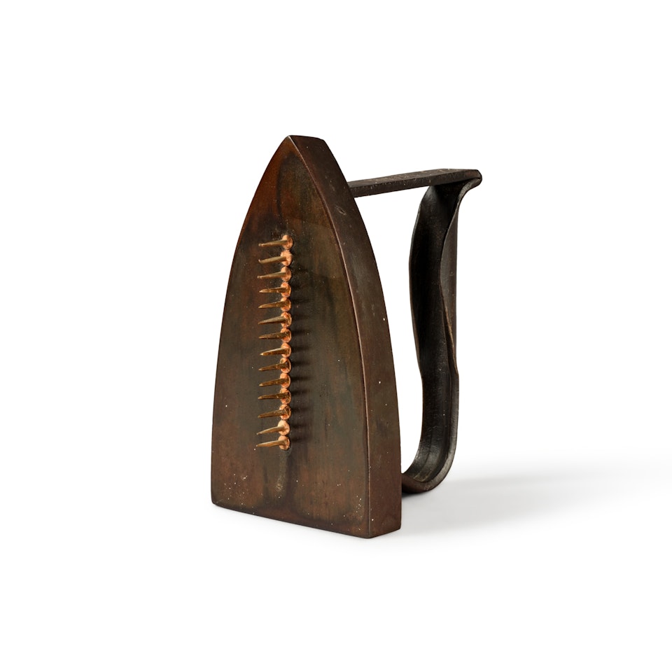 Cadeau by Man Ray