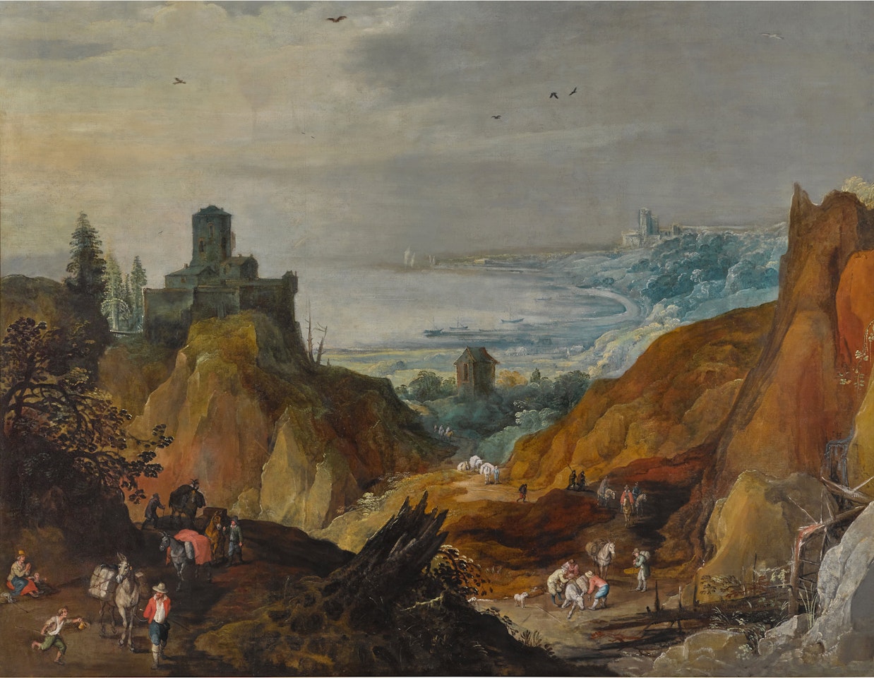 An extensive mountainous landscape with travellers on a path, with a castle and the sea beyond by Joos de Momper the Younger