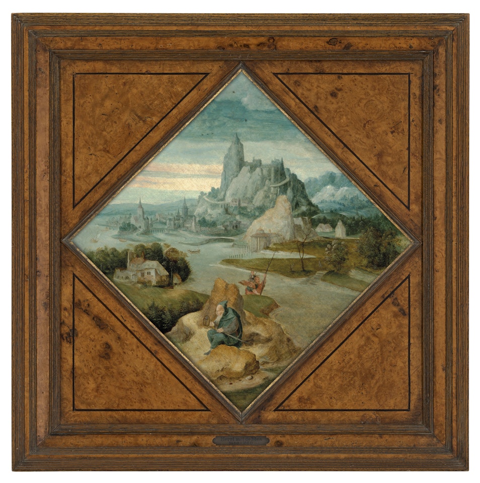 A river landscape with Saint Christopher carrying the Christ Child, guided by a hermit with a lantern on the shore by Herri met de Bles