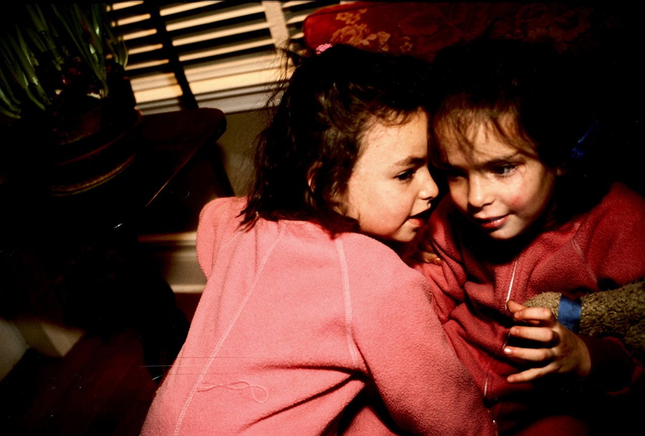 The Twins Gossiping, Thanksgiving, Connecticut by Nan Goldin