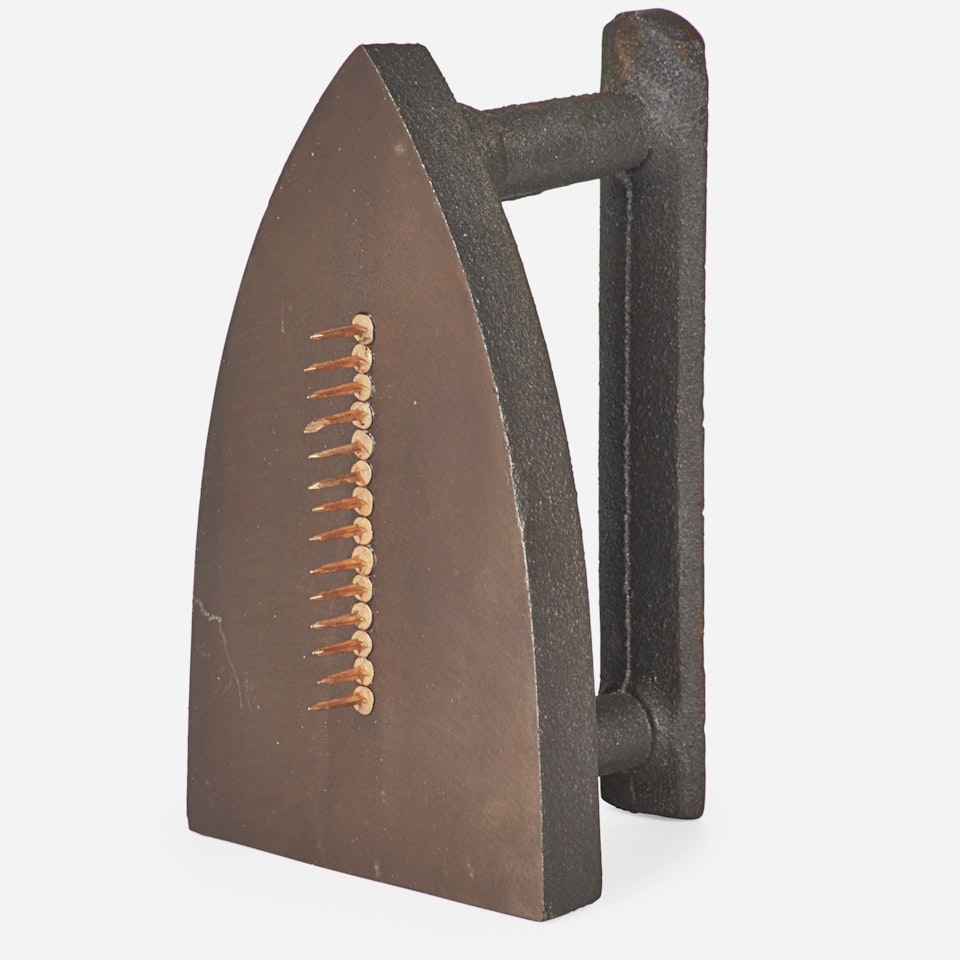 Cadeau by Man Ray