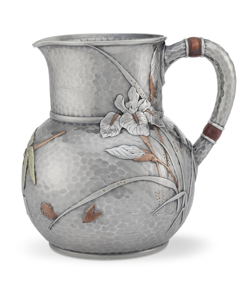 AN AMERICAN SILVER AND MIXED-METAL WATER PITCHER by Tiffany & Co.