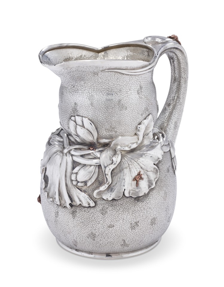 AN AMERICAN SILVER AND MIXED-METAL WATER PITCHER by Tiffany & Co.