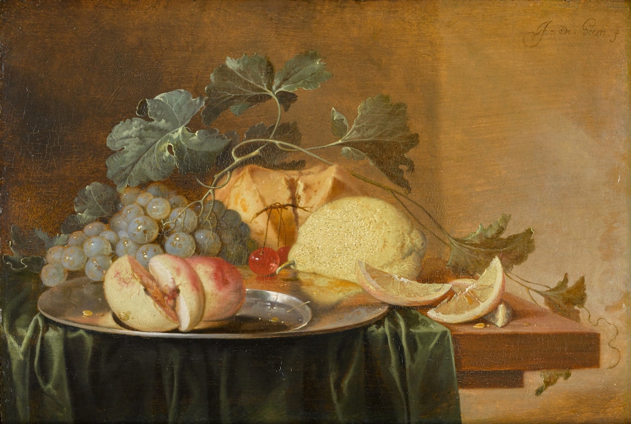 Still life with peaches on a pewter plate, together with grapes, bread, cherries, and a lemon, all on a wooden table draped with a green cloth by Jan Davidsz de Heem
