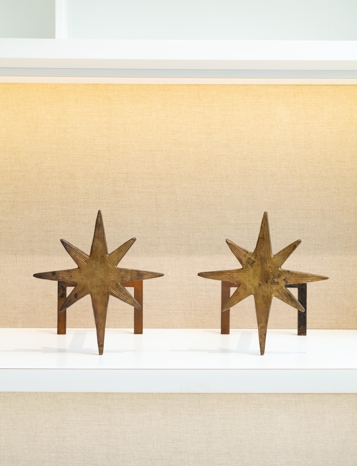 Pair of Aux étoiles andirons by Diego Giacometti