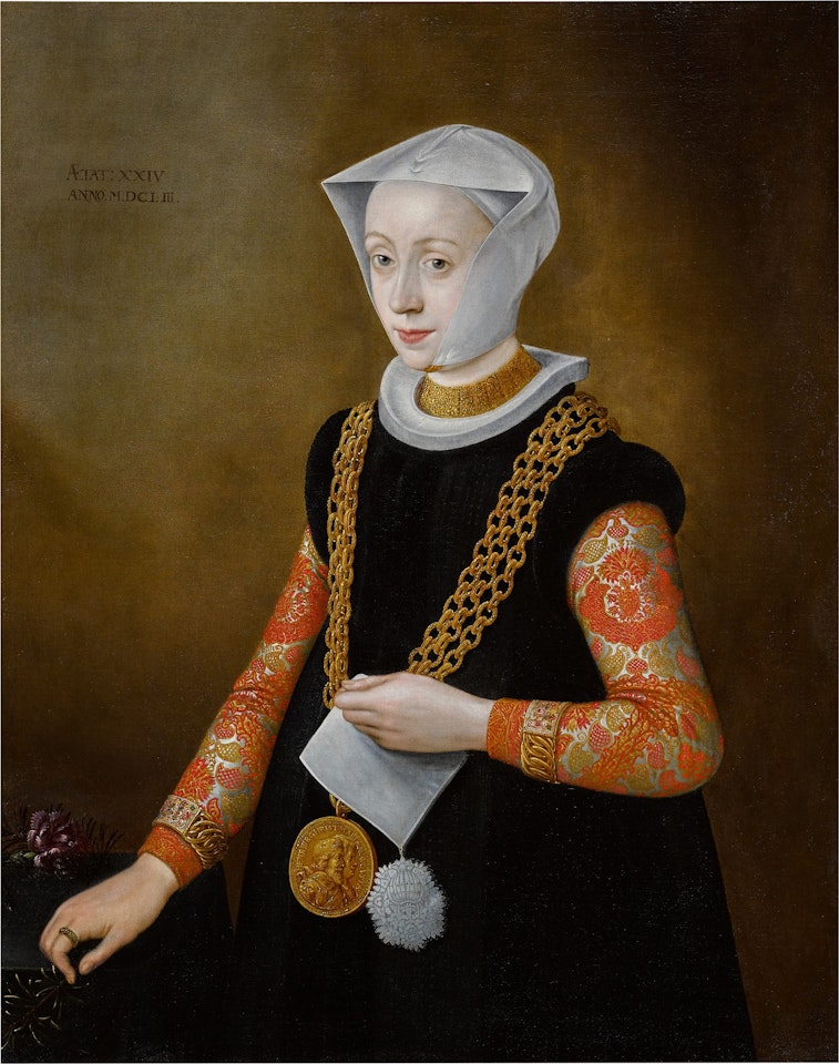 Portrait of a lady wearing a portrait medal of Henry IV and Marie de" Medici by French School