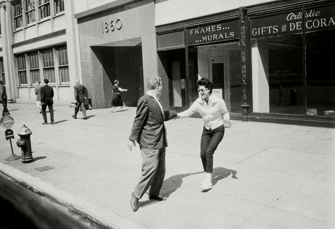 "From the Bus NYC" (Woman and Man on the Sidewalk) by Robert Frank