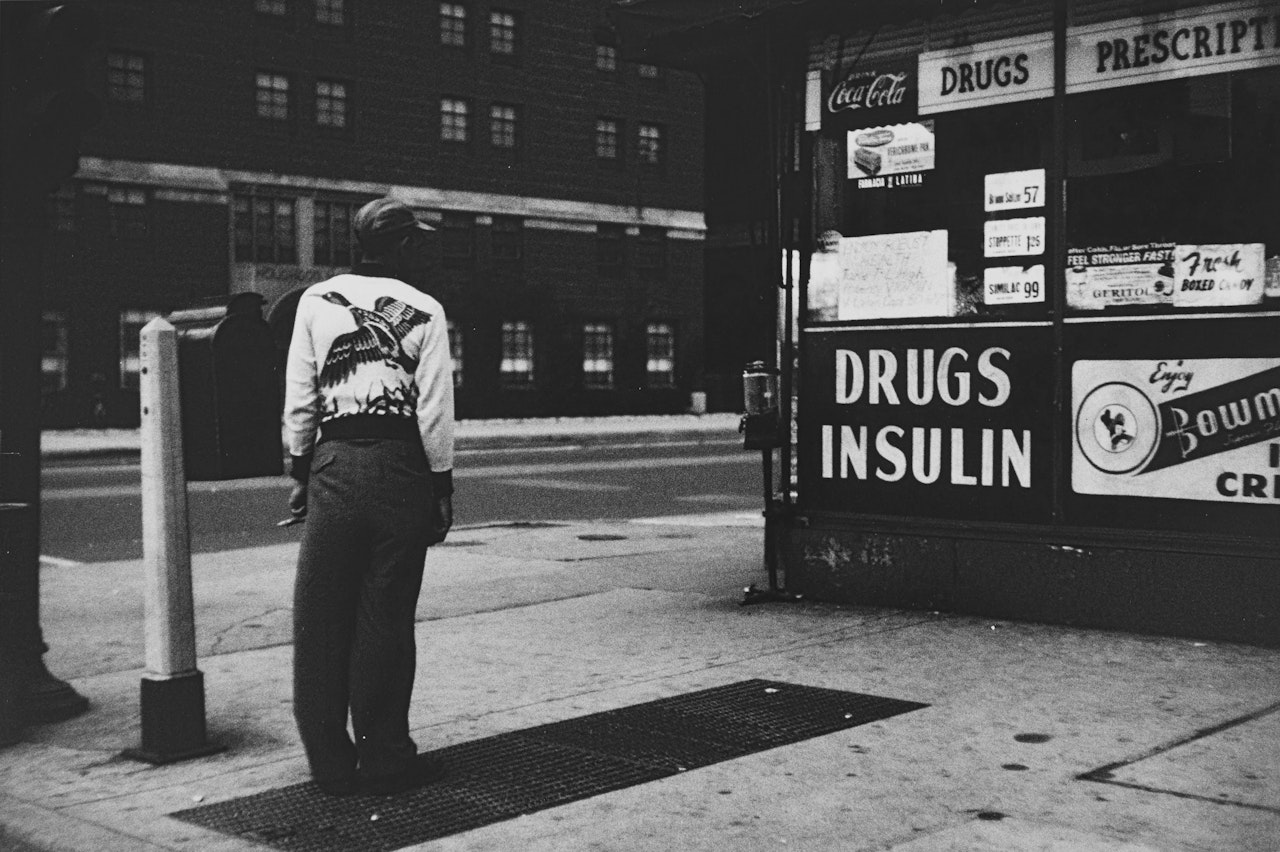 "Chicago" (Man and Pharmacy) by Robert Frank