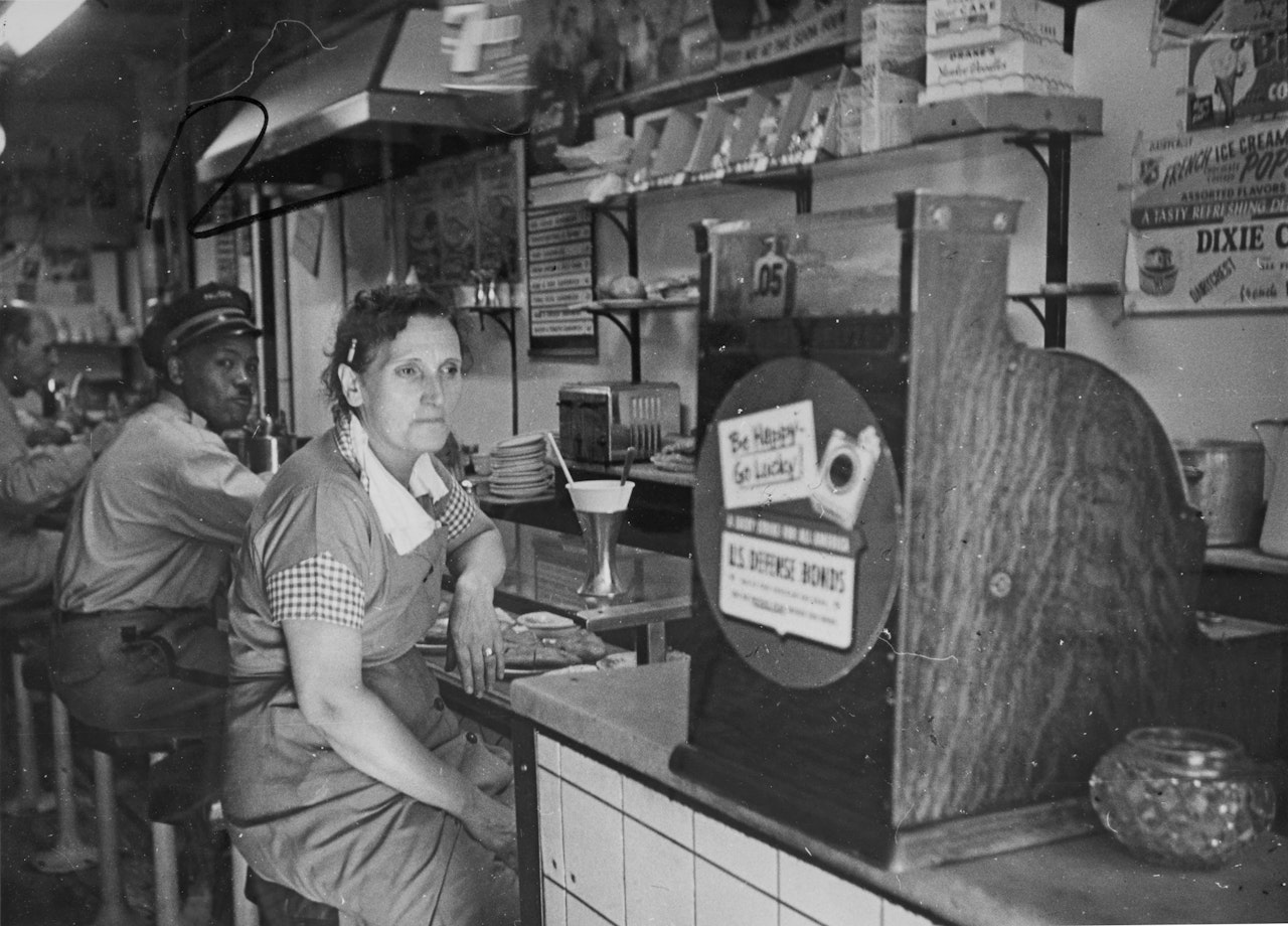"11th St" (from "11th Street Story/People You Don"t See") by Robert Frank