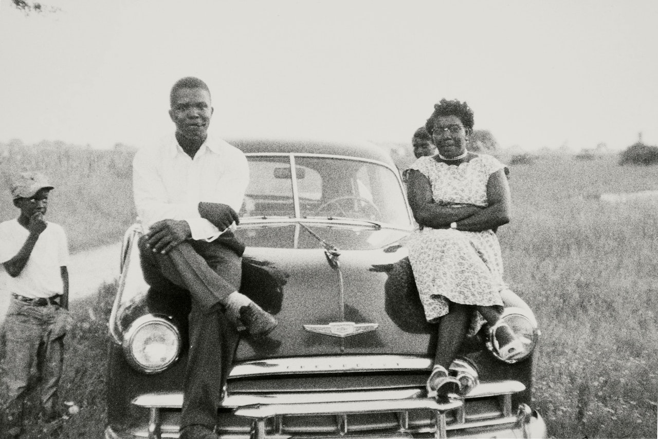 "Beaufort S. C." (Couple Seated on the Hood of a Car) by Robert Frank