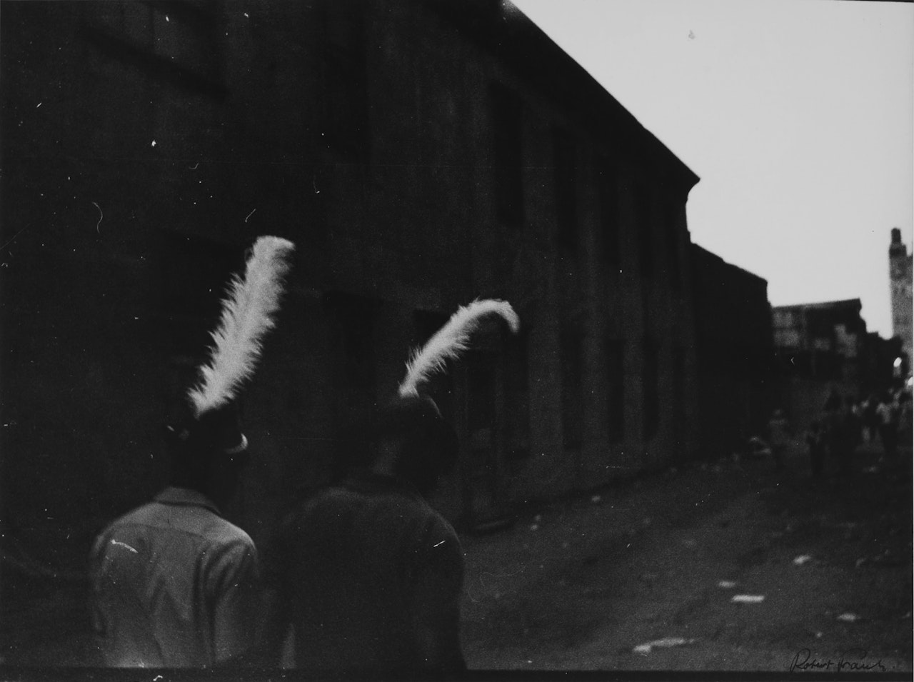 "Coney Isld" (Men with Feathered Hats) by Robert Frank
