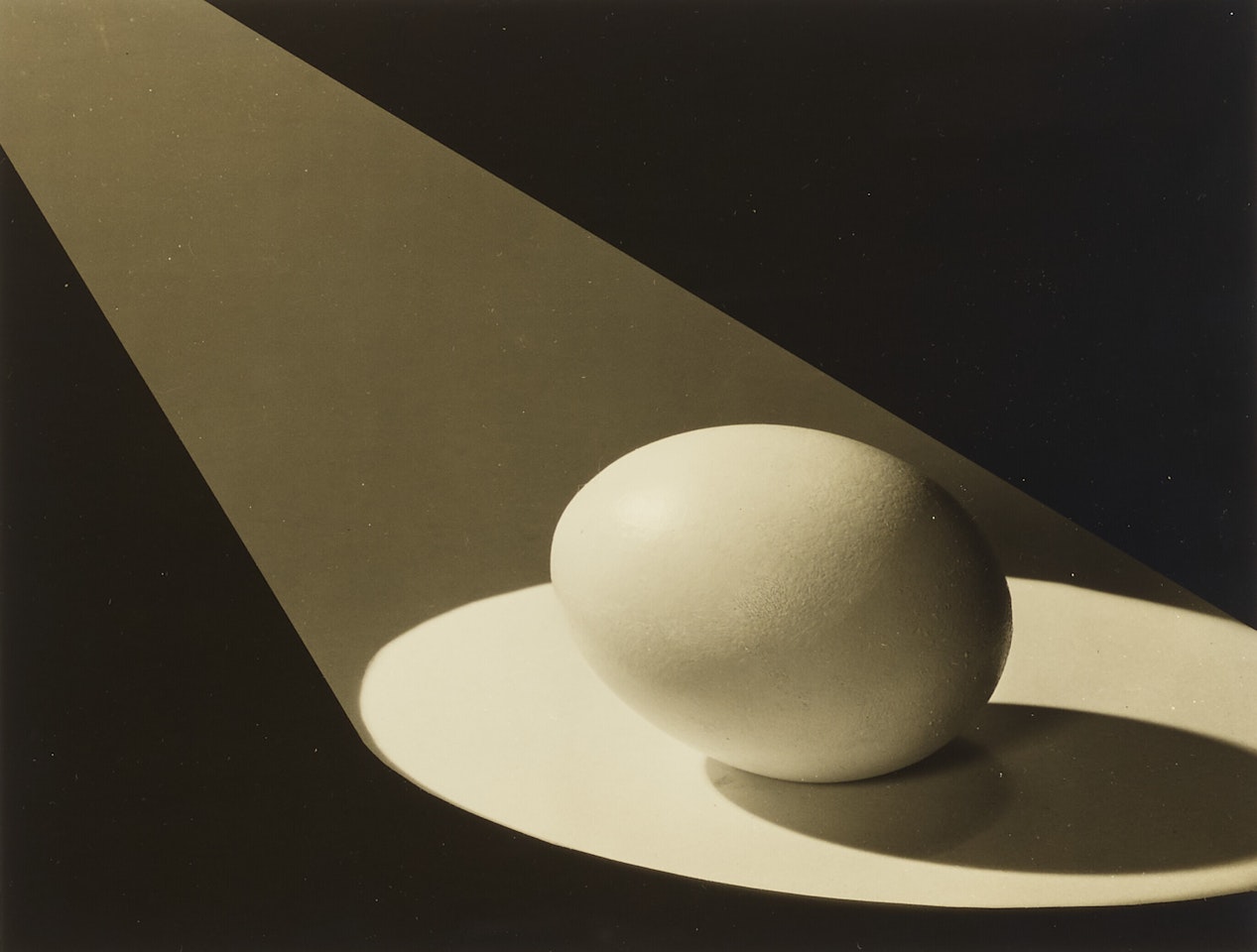 Egg in Spotlight by Paul Outerbridge, Jr