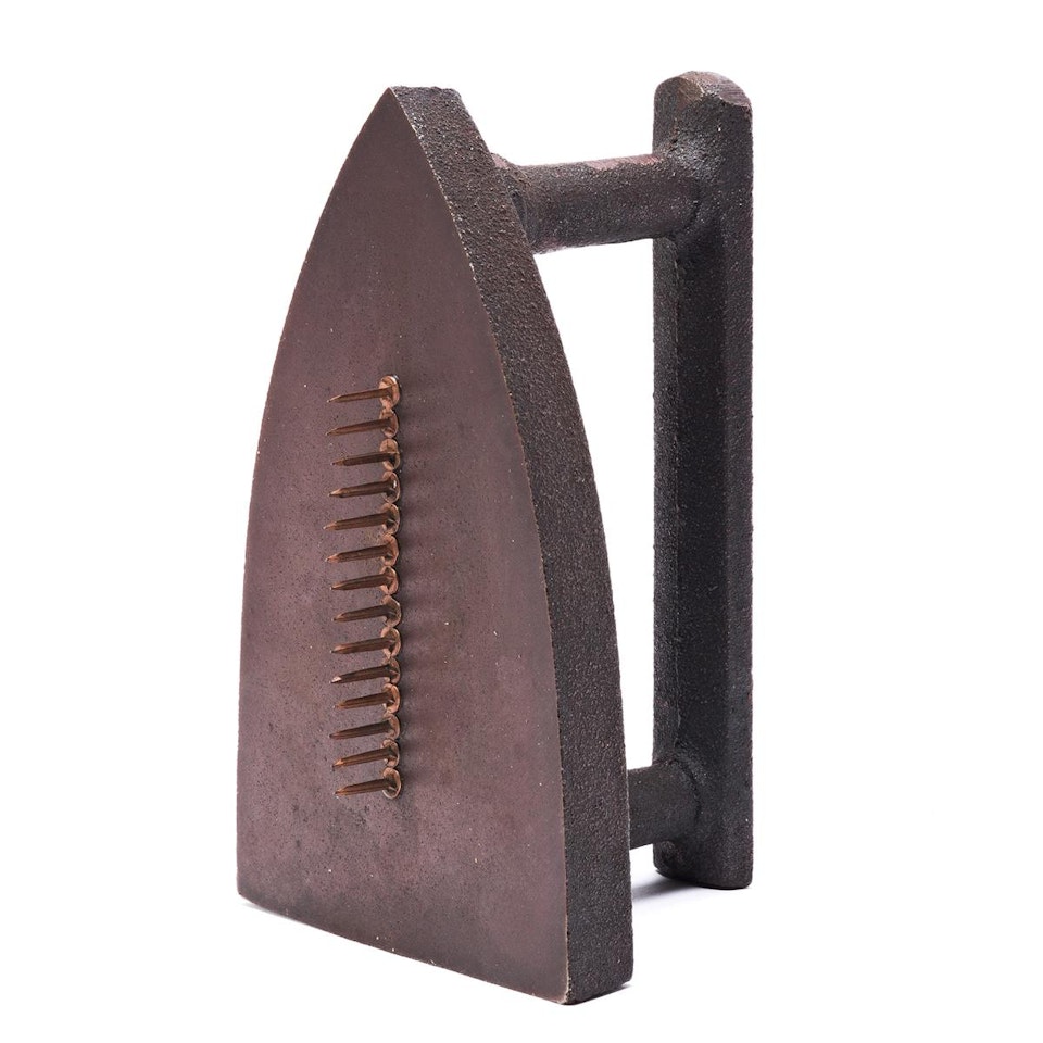Cadeau by Man Ray