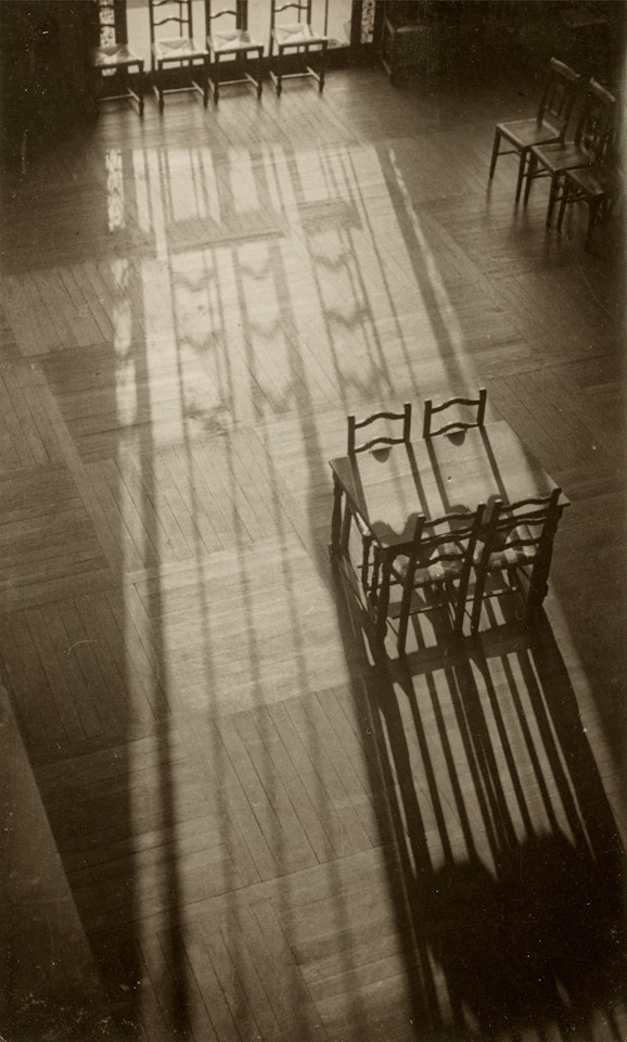 Chairs in the American Library, Paris by André Kertész