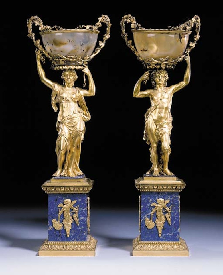 Bacchas and Bacchante holding tazza with trailing vine leaf handles by Italian School