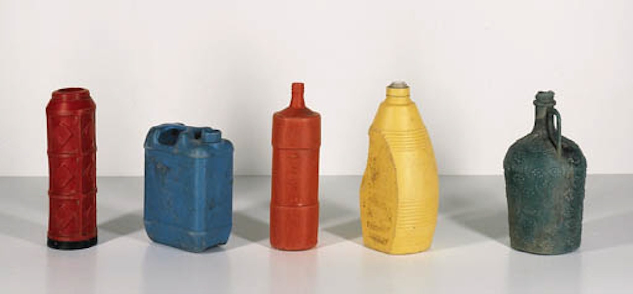 Five standing bottles by Tony Cragg
