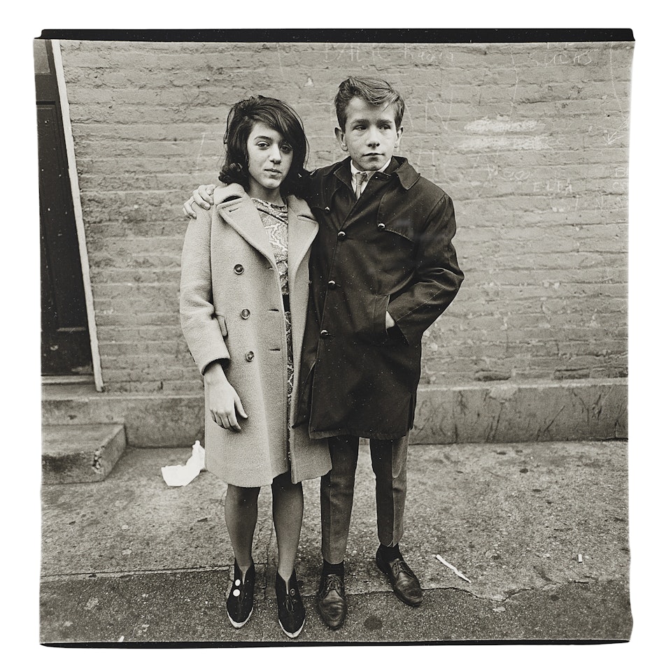 Teenage couple on Hudson Street, N.Y.C. by Diane Arbus