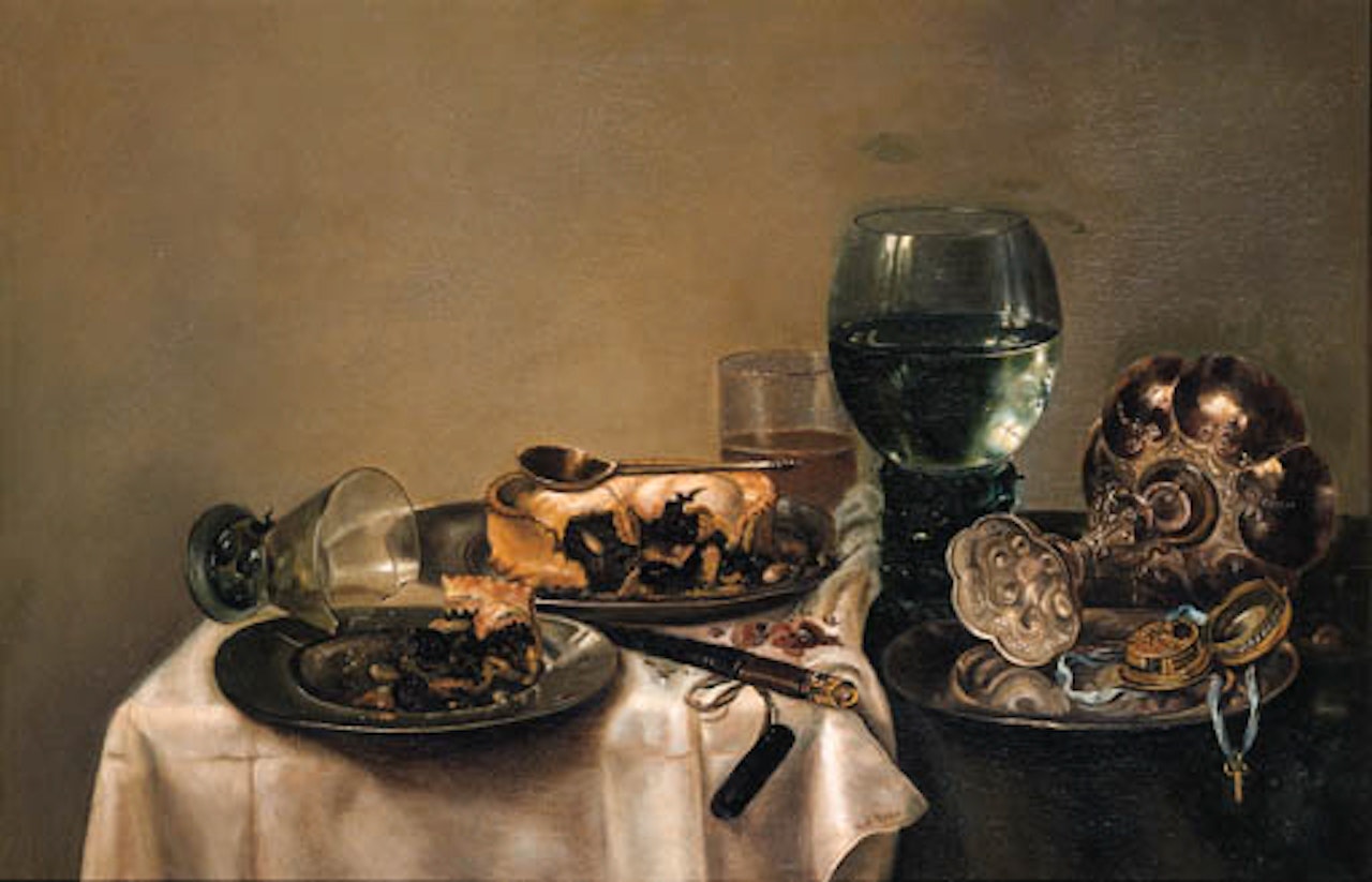 Still life with two pies, spoon, knife, hazelnuts on table by Willem Claesz Heda